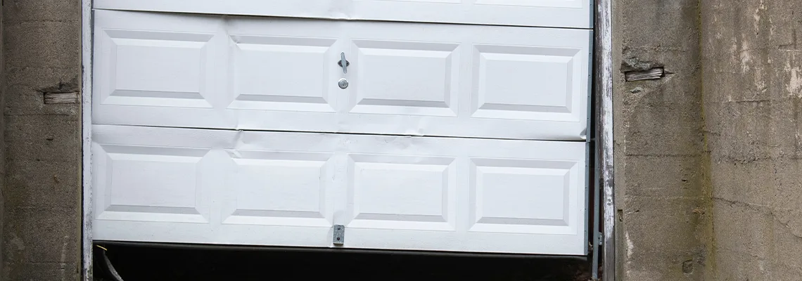 Garage Door Got Hit By A Car Dent Removal in Richmond Hill, ON